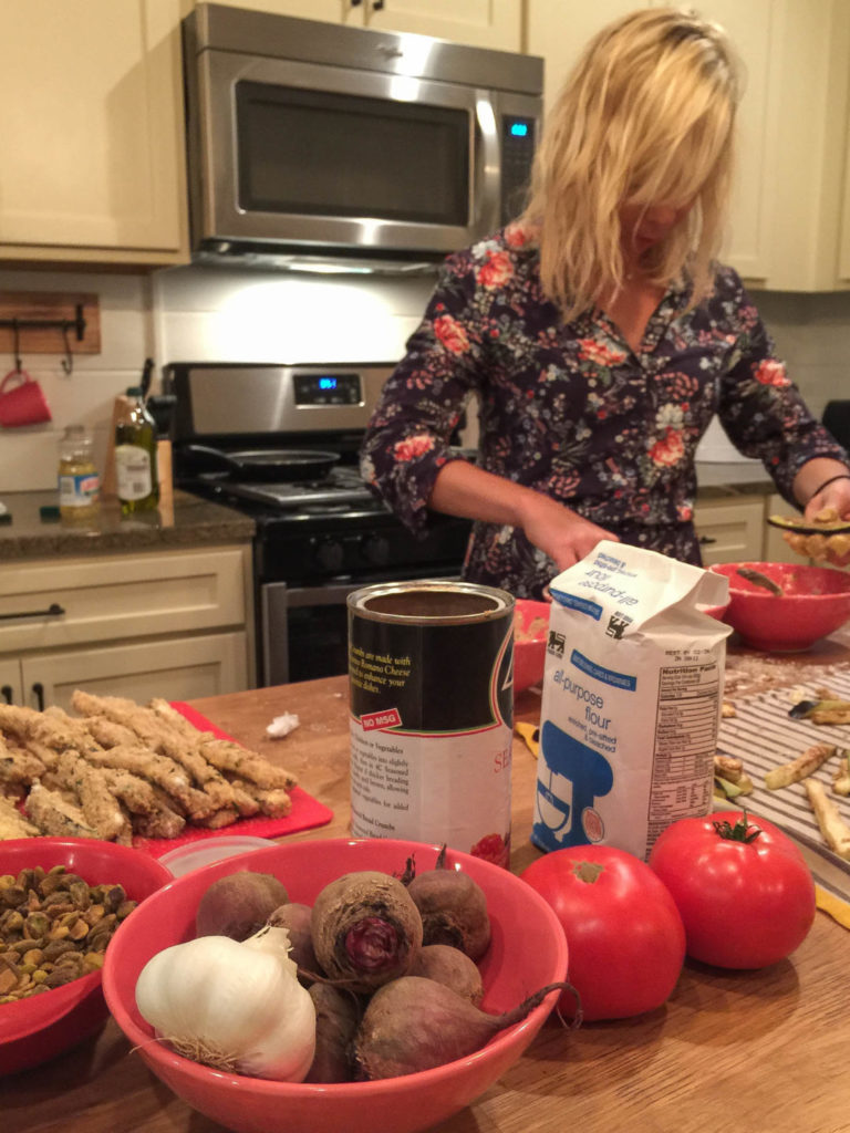 Julie using the amazing kitchen space at the 35 North cottage to prep our birthday dinner.